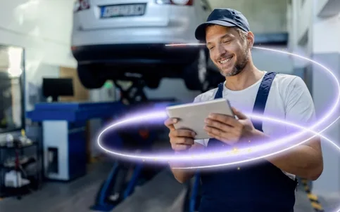 happy-auto-repairman-working-touchpad-workshop-twist-1